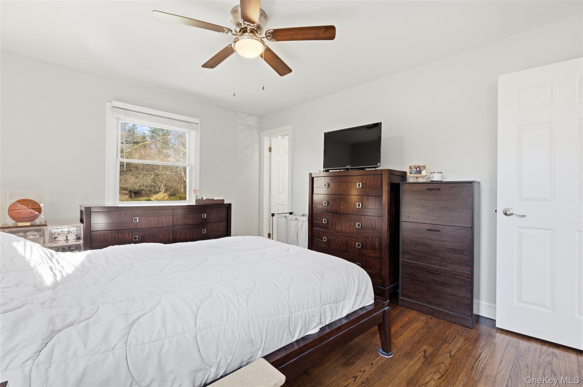 39 Benjamin Road Mahopac, NY 10541 - Photo 16 of 39 Primary Bedroom w/ En-Suite, featuring wood finished floors and ceiling fan