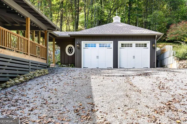 a view of a park with large trees