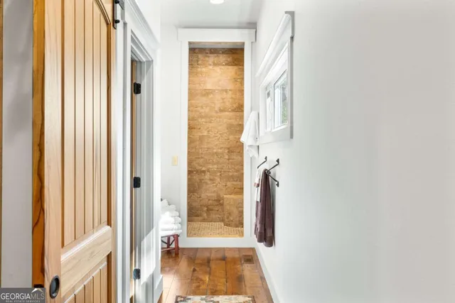 a view of a swimming pool with sitting area