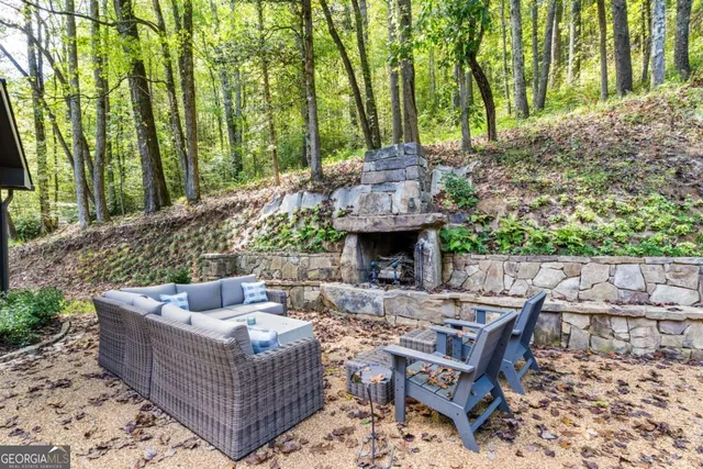 a view of outdoor space with wooden floor and furniture