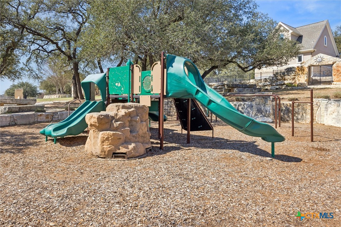 2309 First View Leander, TX 78641 - Photo 31 of 31 A neighborhood playground provides a fun outdoor space for recreation and gathering within the community.
