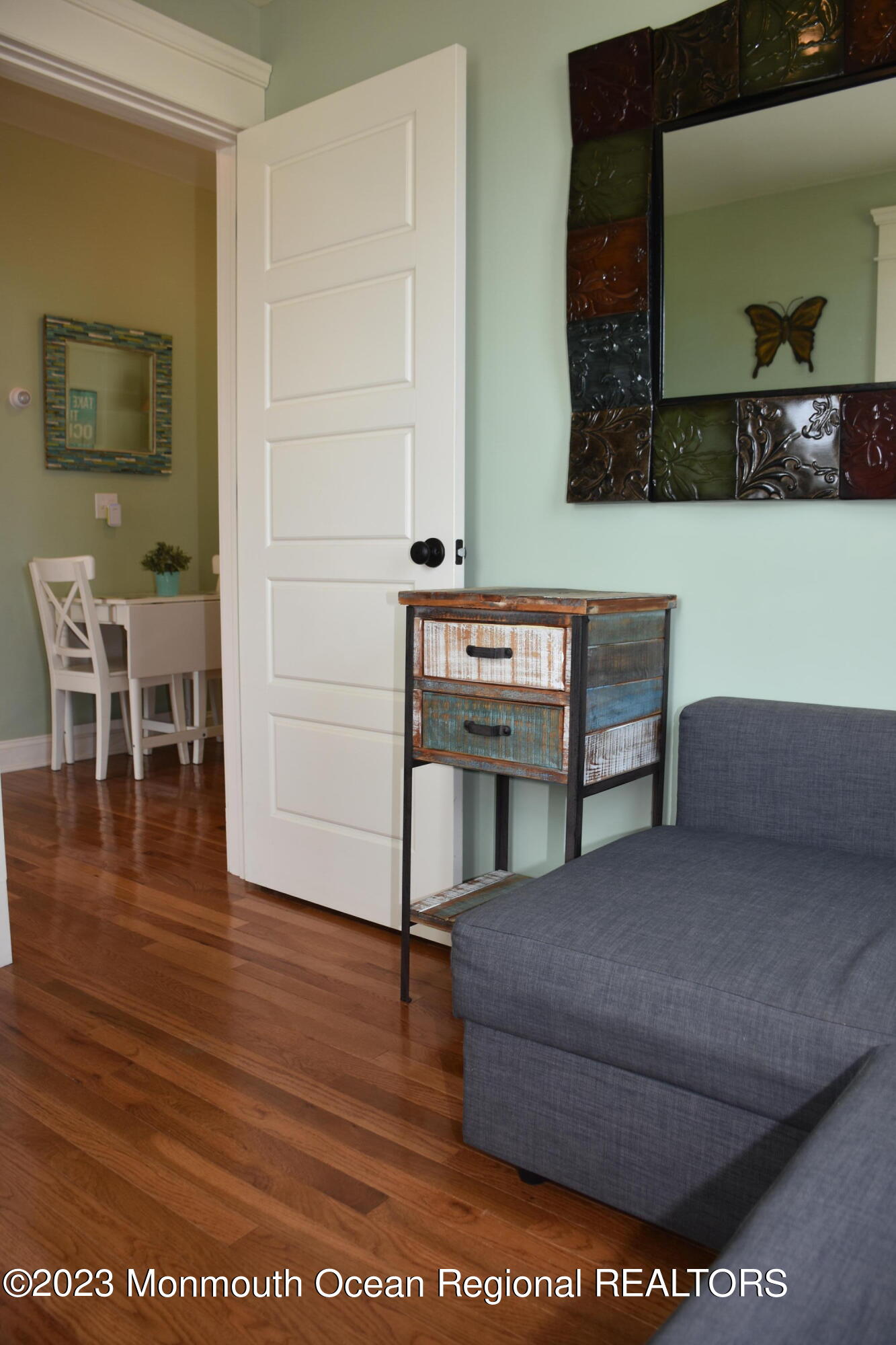 58 5th Street, Unit F Highlands, NJ 07732 - Photo 23 of 33 a living room with furniture and a wooden floor