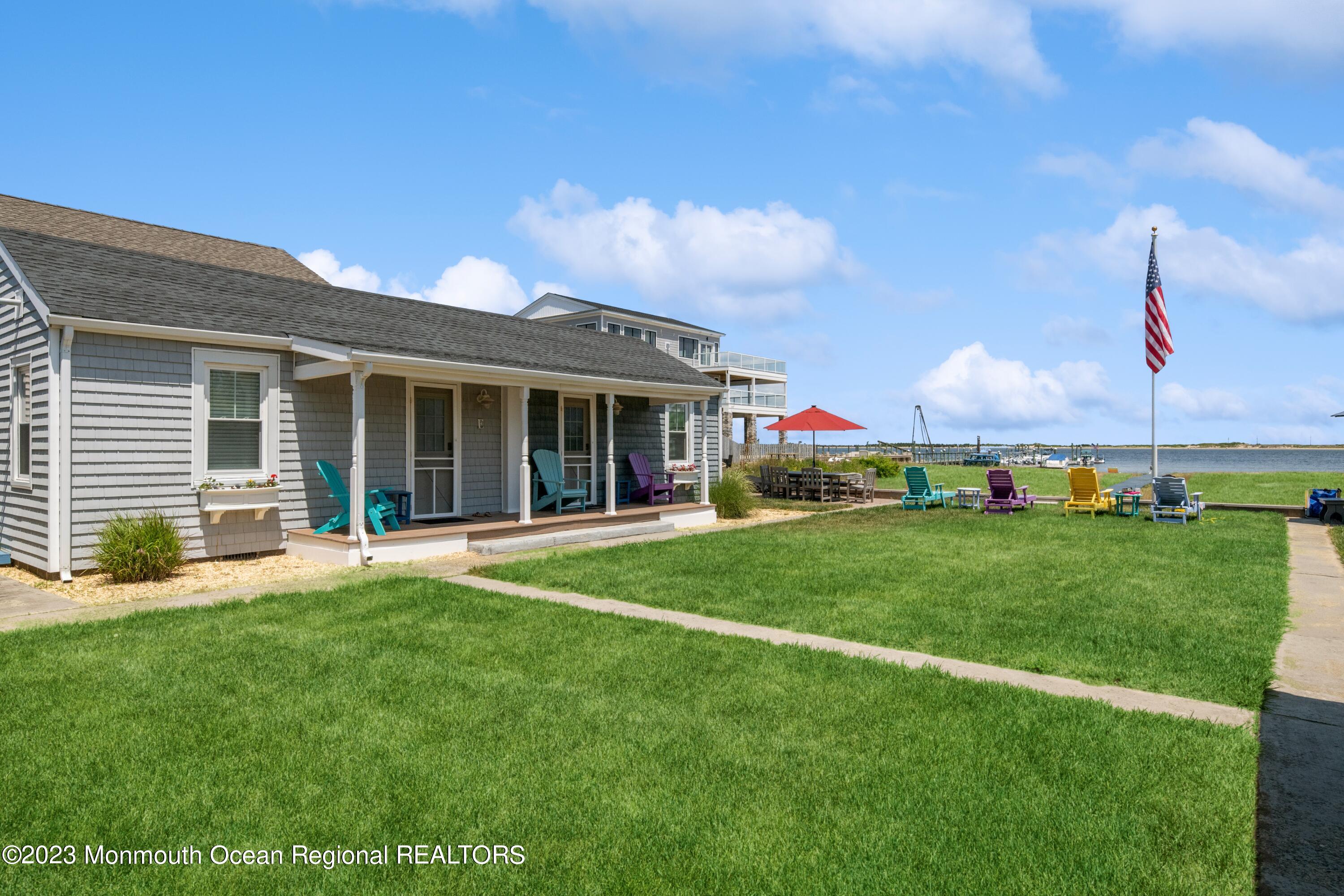 58 5th Street, Unit F Highlands, NJ 07732 - Photo 33 of 33 a front view of house with yard and green space