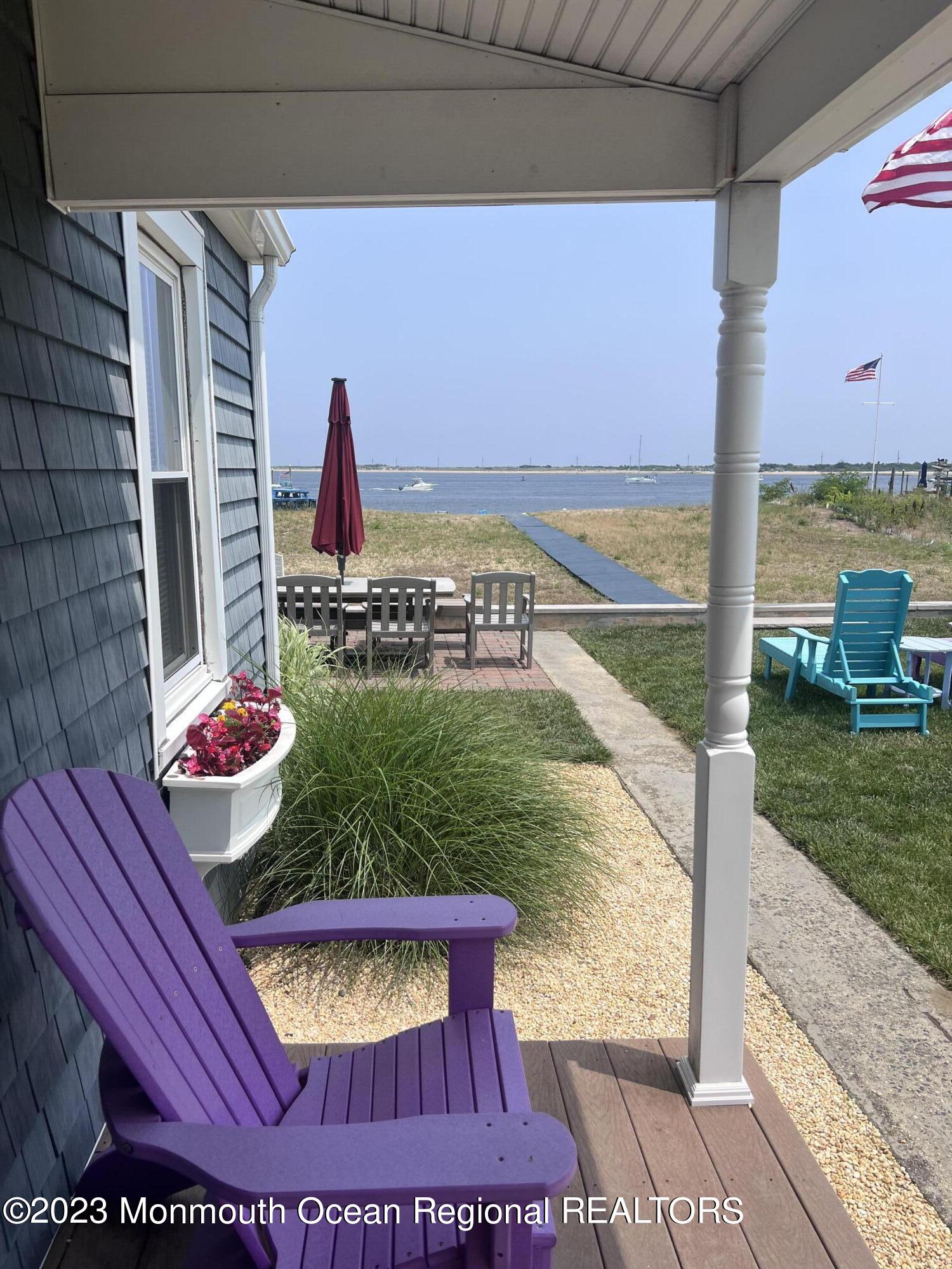58 5th Street, Unit F Highlands, NJ 07732 - Photo 4 of 33 a view of a swimming pool with a back yard