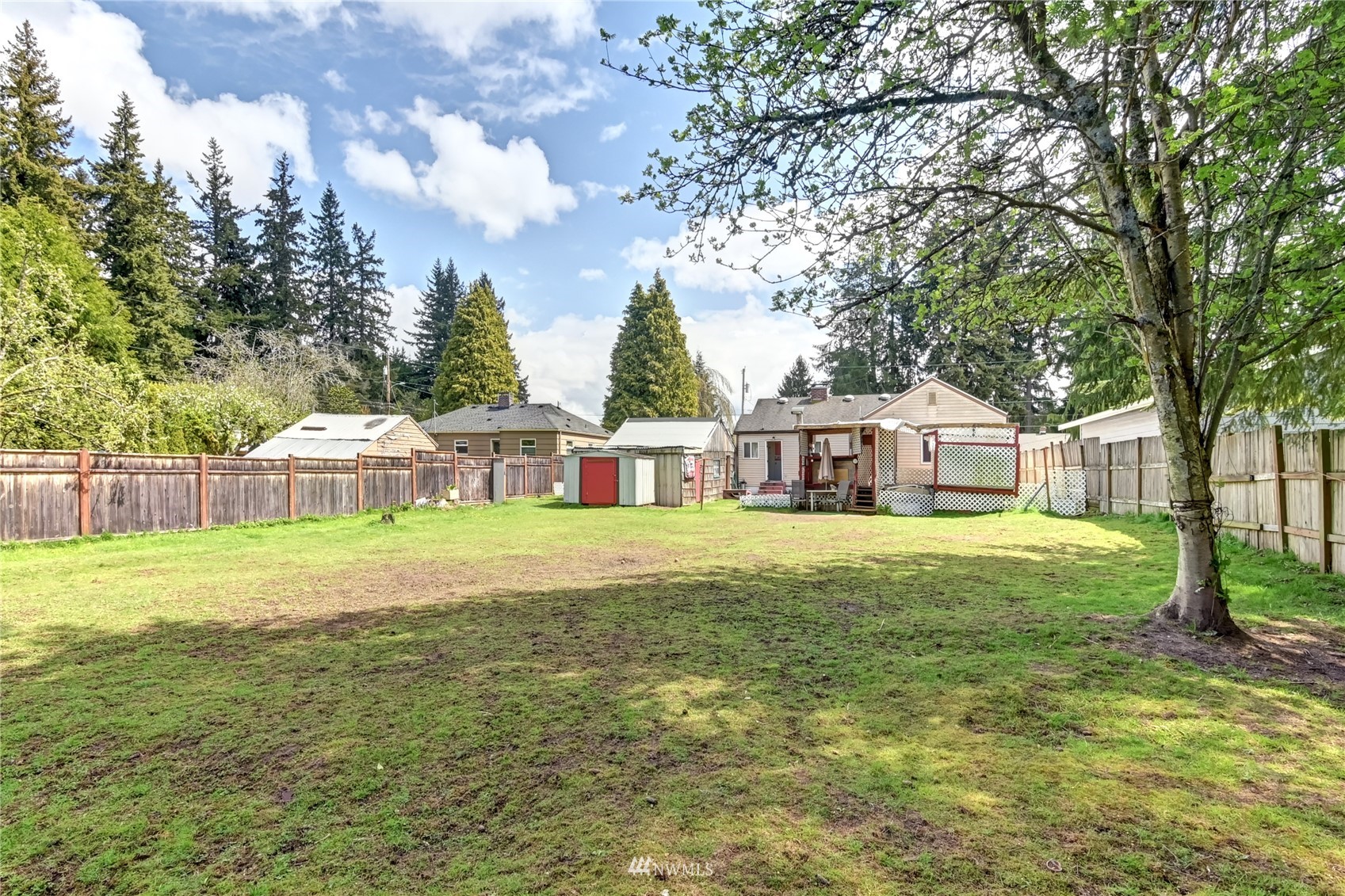 6932 Carson Road Everett, WA 98203 - Photo 22 of 24 a front view of a house with a garden