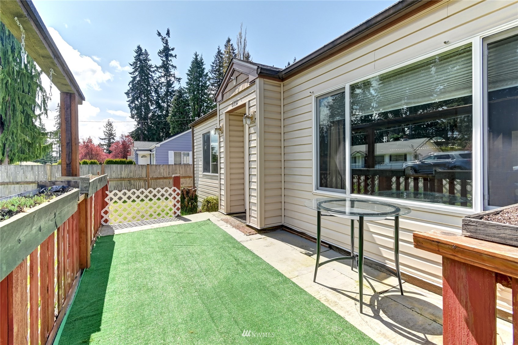 6932 Carson Road Everett, WA 98203 - Photo 24 of 24 a view of a house with backyard and porch