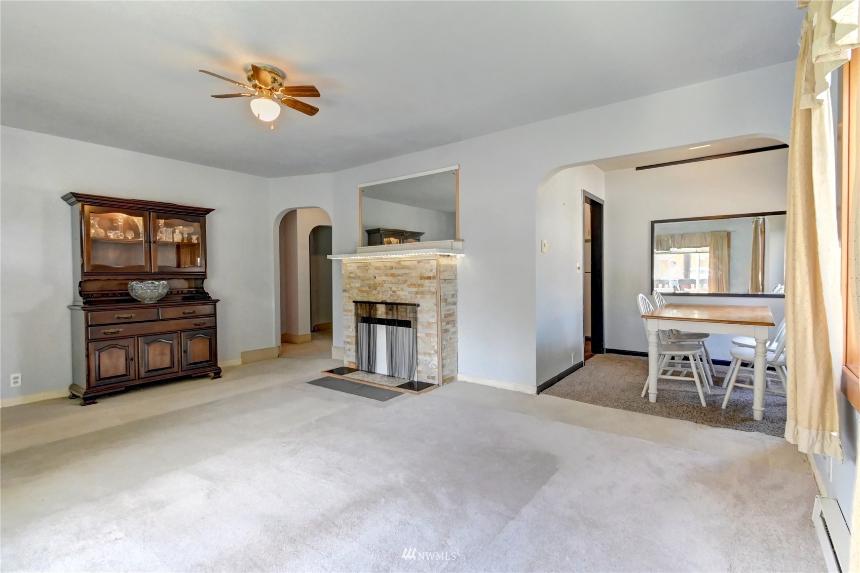6932 Carson Road Everett, WA 98203 - Photo 5 of 24 a living room with furniture and a kitchen