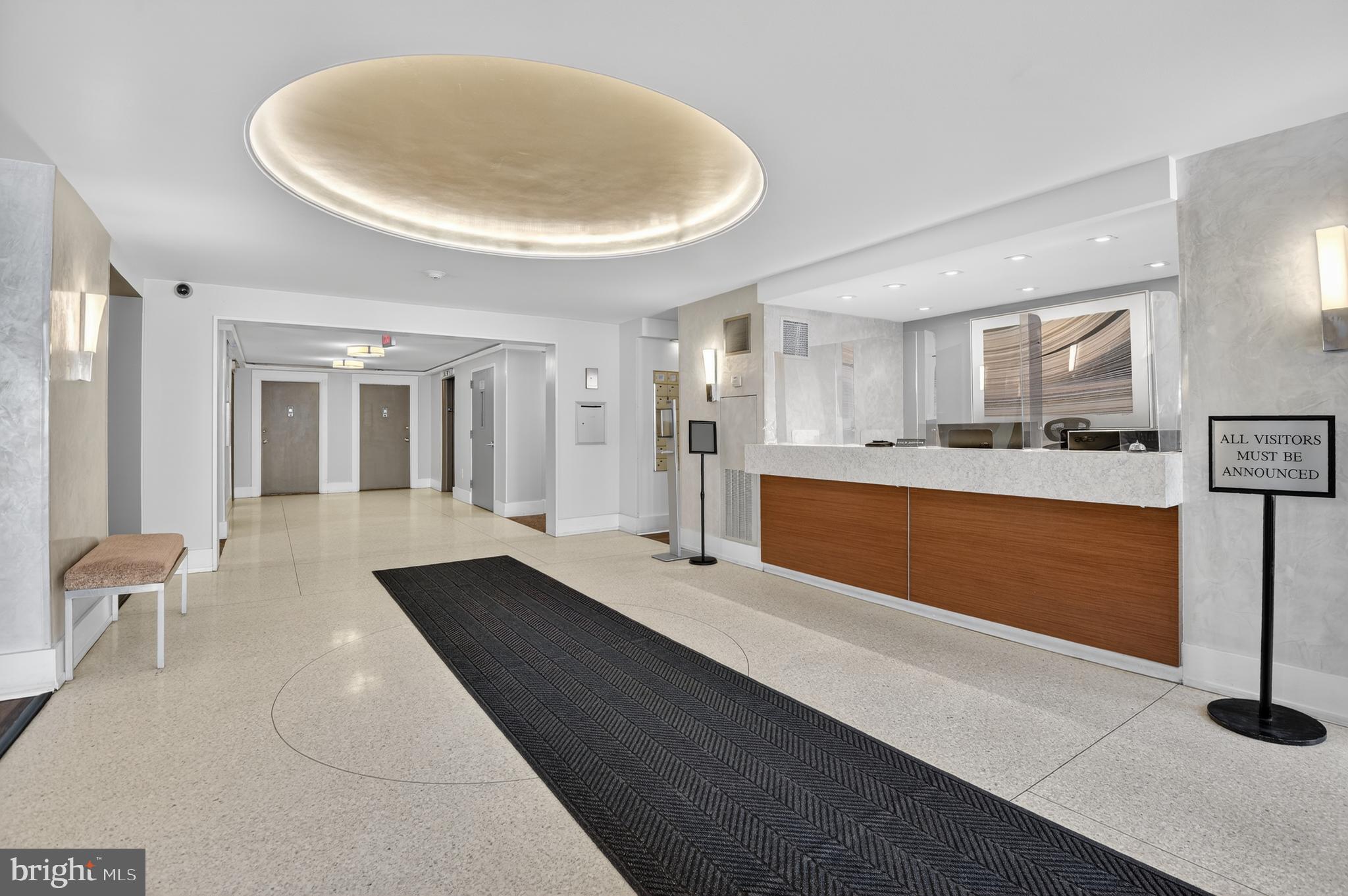 4000 Tunlaw Road Northwest, Unit 415 Washington, DC 20007 - Photo 18 of 28 a large white kitchen with a large window