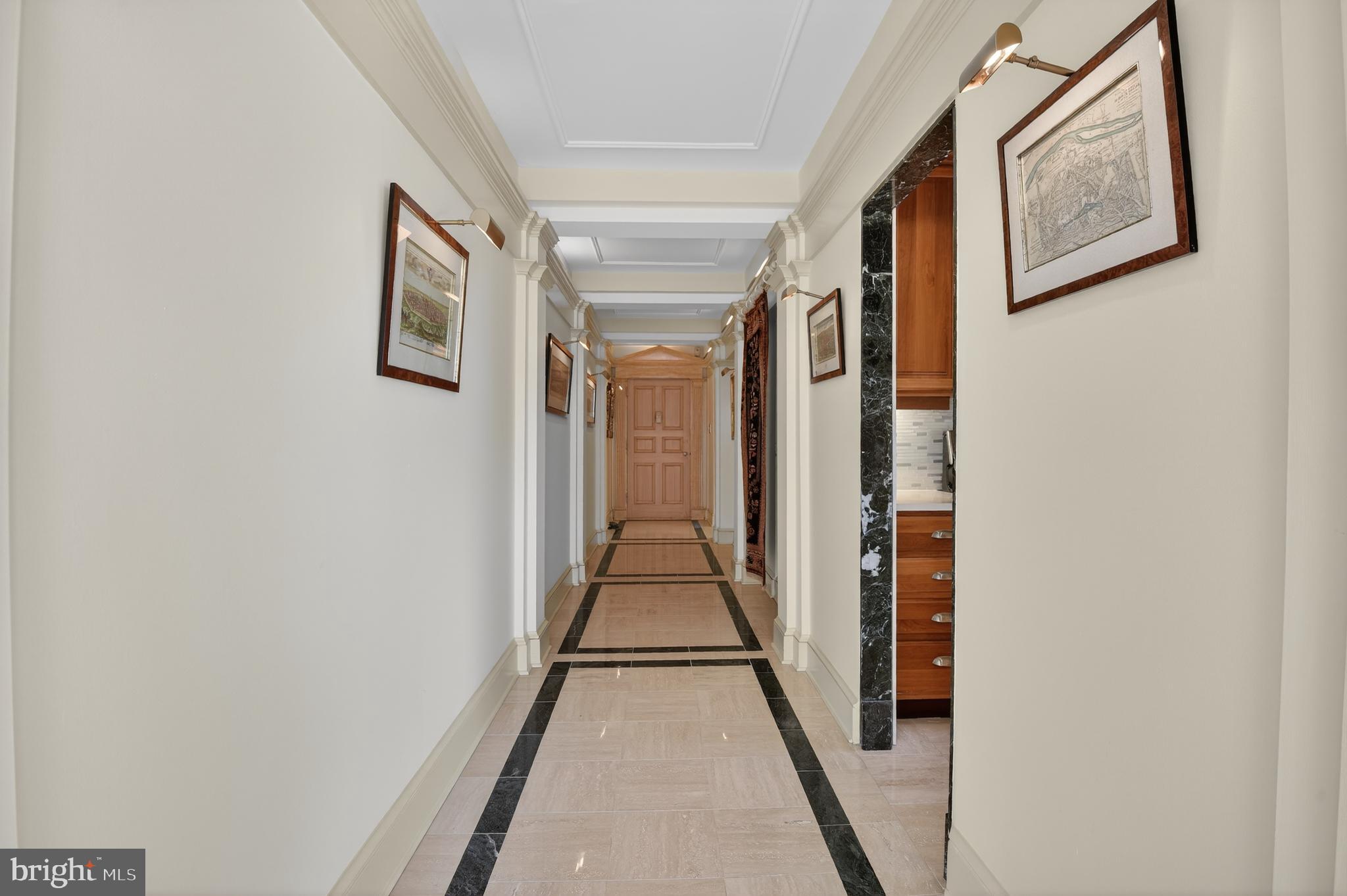 4000 Tunlaw Road Northwest, Unit 415 Washington, DC 20007 - Photo 2 of 28 a view of a hallway with wooden floor and stairs