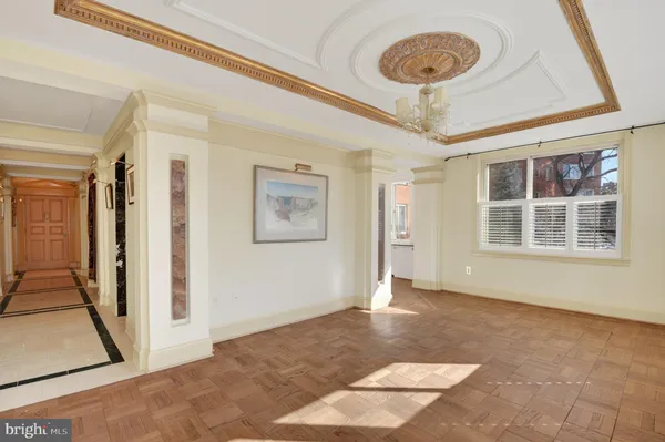 a view of an empty room with a window