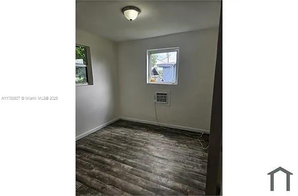 26625 Southwest 139th Avenue, Unit 26625 Homestead, FL 33032 - Photo 4 of 6 a view of a room that has a window in it