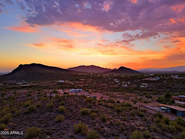 a view of a city with mountains