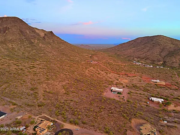 a view of mountains and valleys