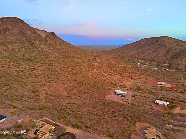 a view of mountains and valleys