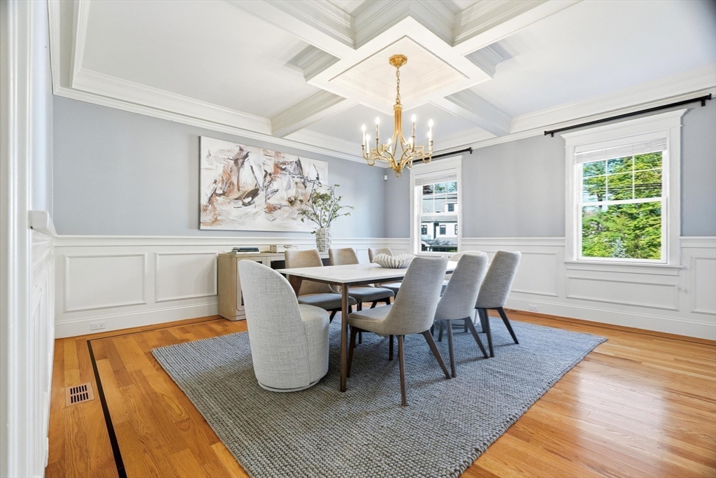 6 Flintlock Road Lexington, MA 02420 - Photo 14 of 39 a view of a dining room with furniture window and wooden floor
