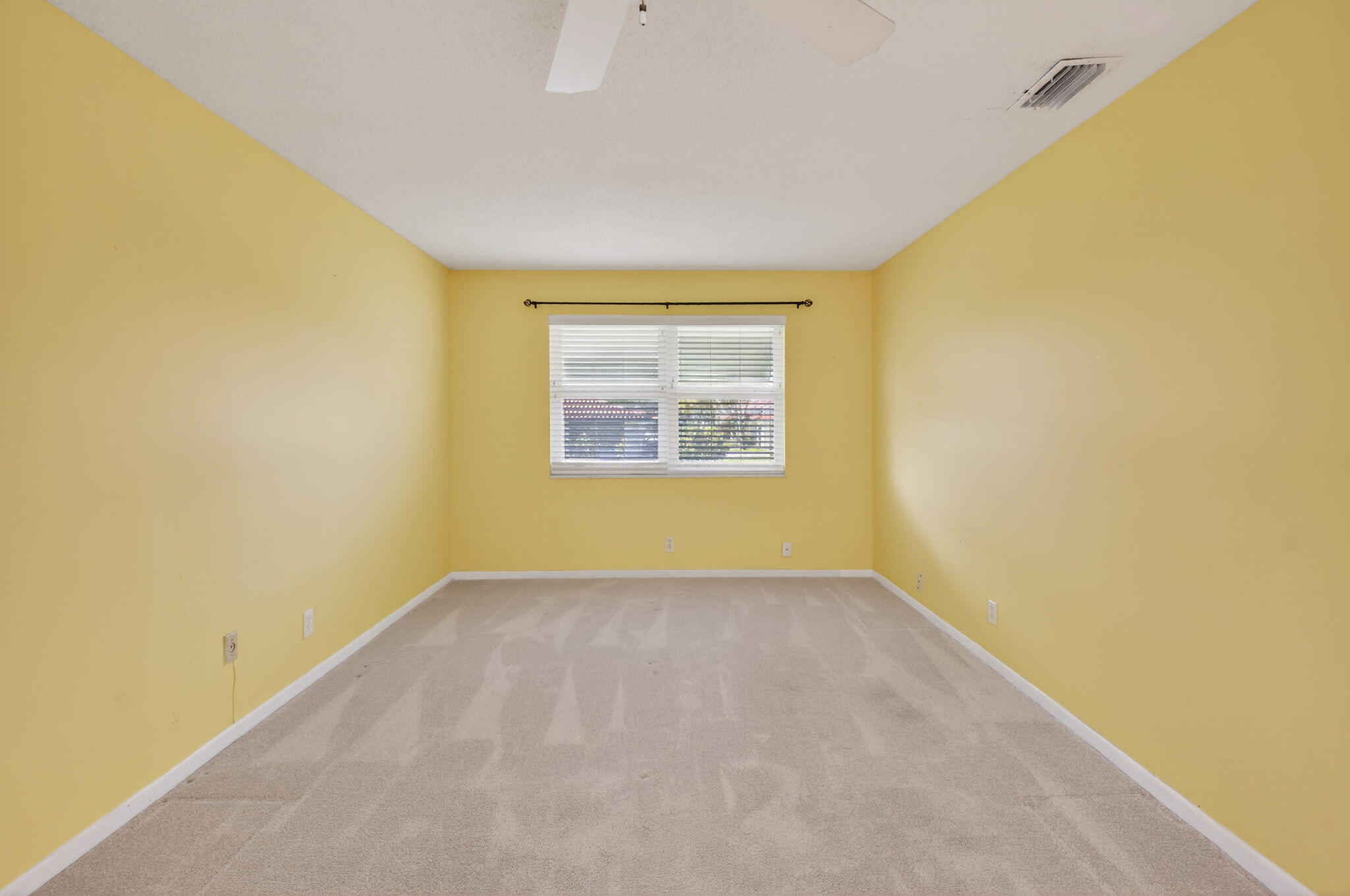 270 High Point Court, Unit D Boynton Beach, FL 33435 - Photo 18 of 41 an empty room with a empty space and a window