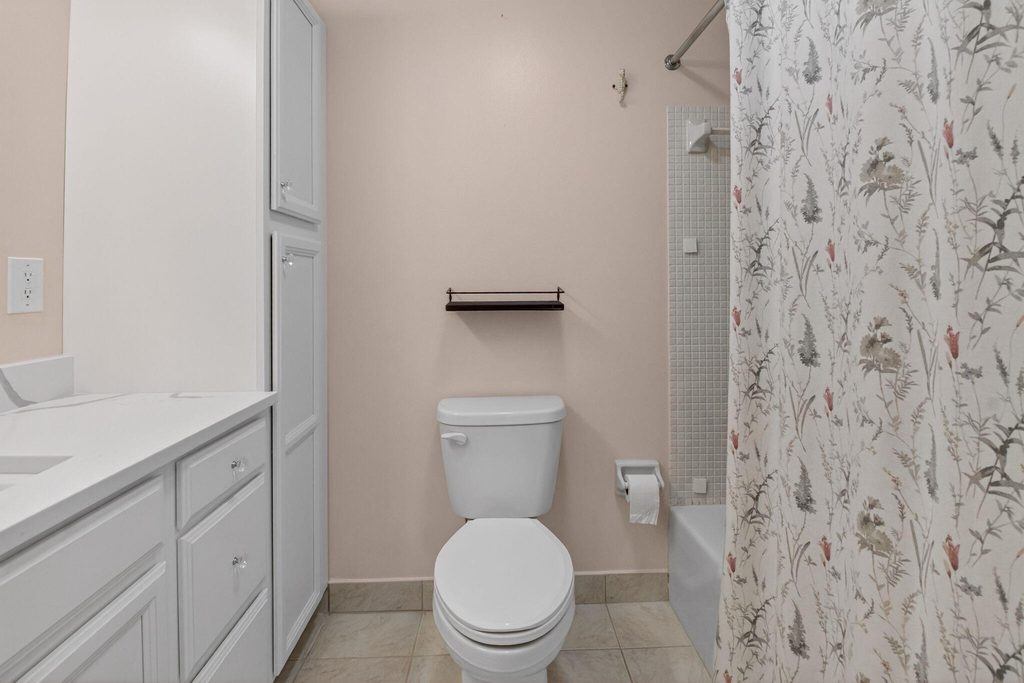 270 High Point Court, Unit D Boynton Beach, FL 33435 - Photo 28 of 41 a white toilet sitting next to a bathroom sink