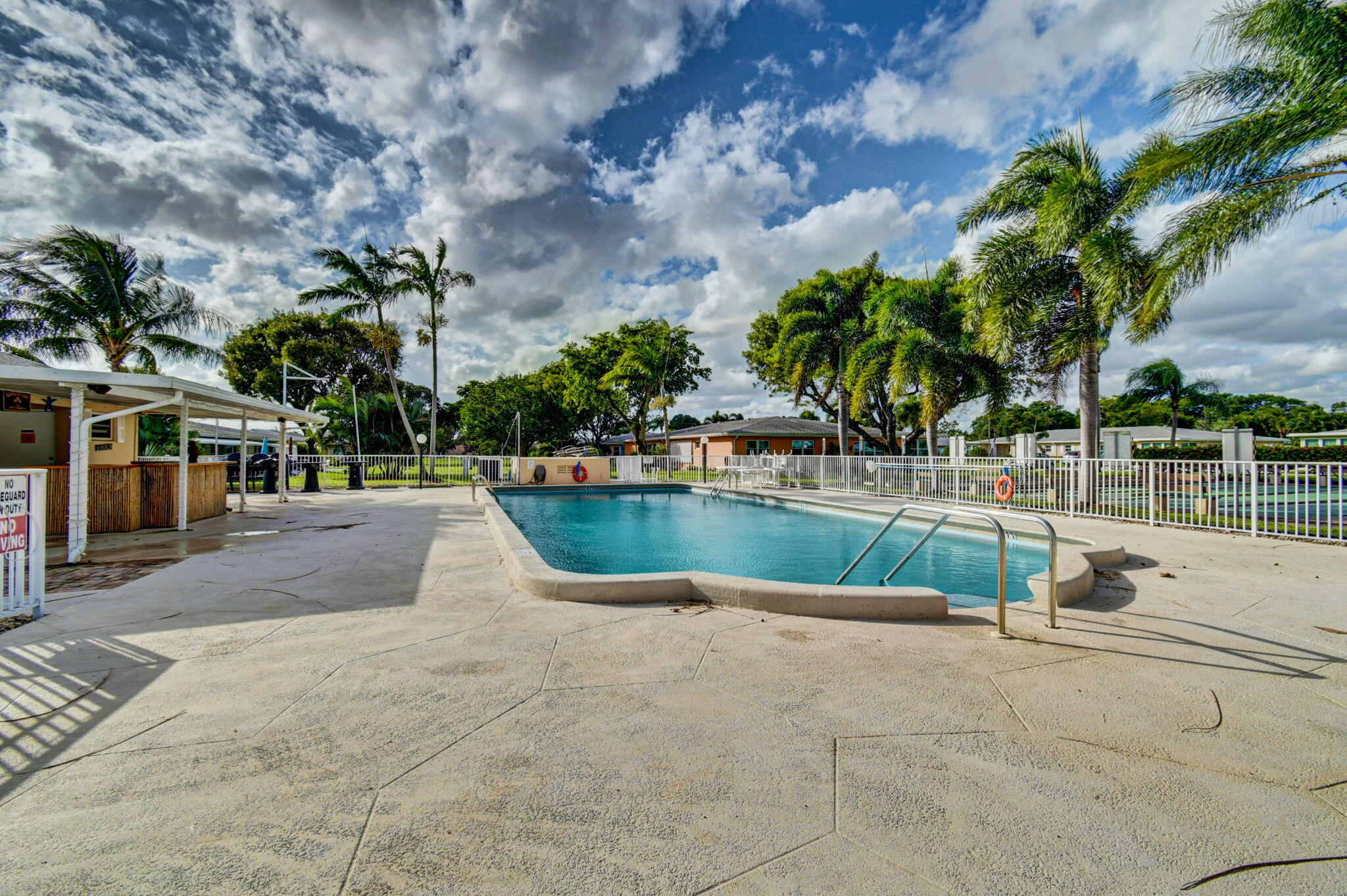 270 High Point Court, Unit D Boynton Beach, FL 33435 - Photo 40 of 41 a view of swimming pool with a patio
