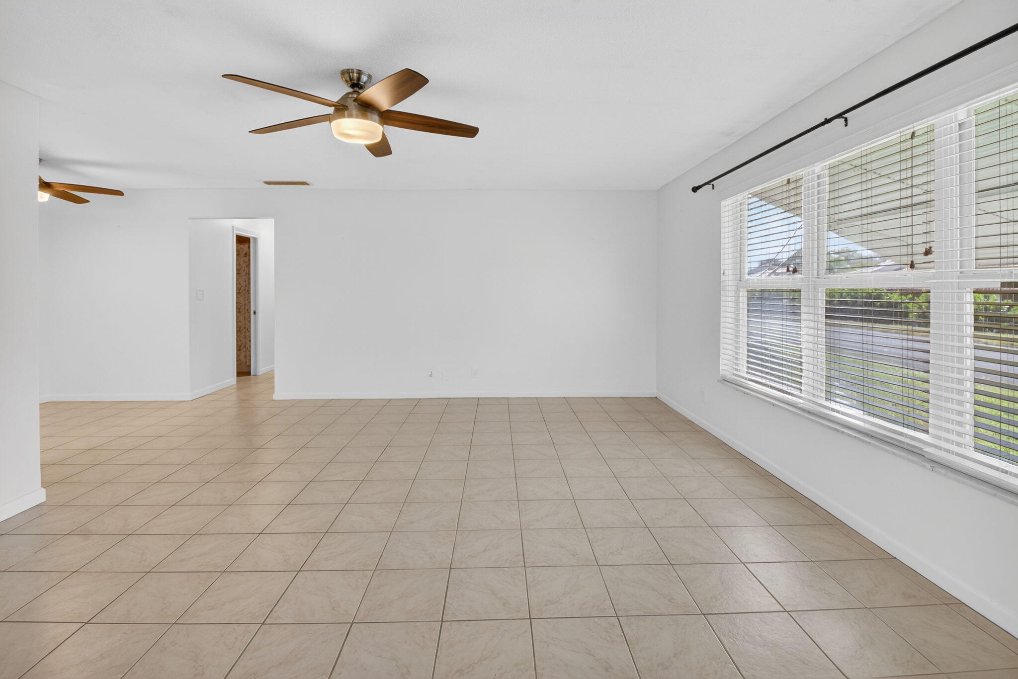 270 High Point Court, Unit D Boynton Beach, FL 33435 - Photo 8 of 41 a view of empty room with ceiling fan