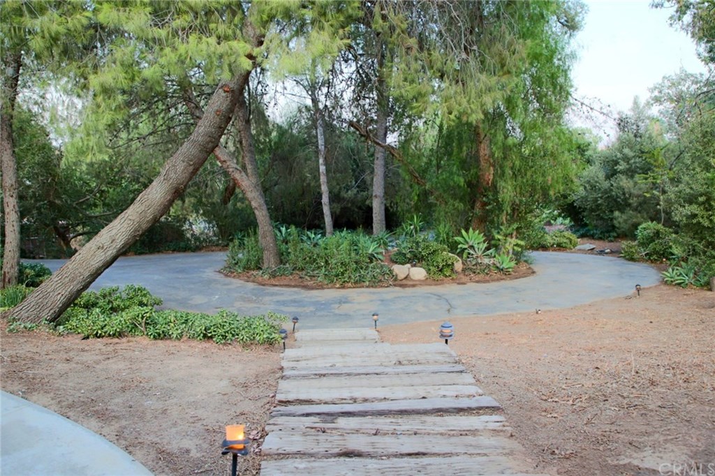 6168 Alhambra Avenue Riverside, CA 92505 - Photo 3 of 29 Photo of the circular drive (fits 5-6 cars) taken from the top of the stairs near the front entry of the home.