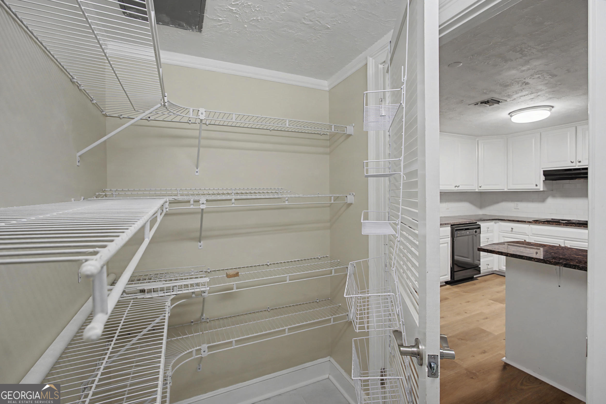 1 7th Street, Unit 1402 Augusta, GA 30901 - Photo 11 of 38 a view of an empty walk in closet