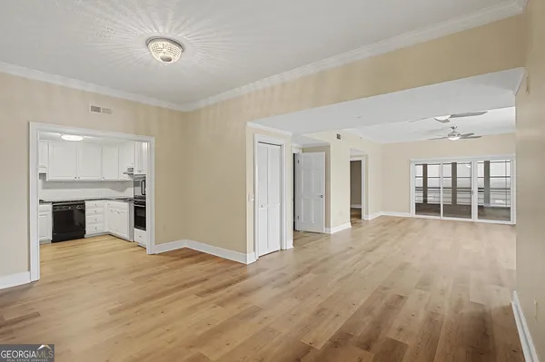 a view of an empty room with a window