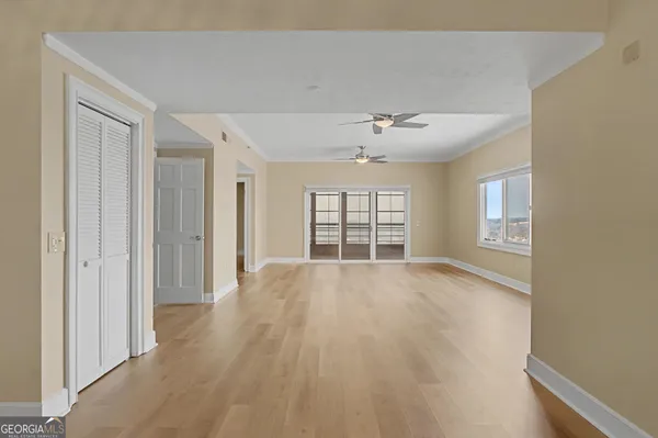 a view of an empty room with a window