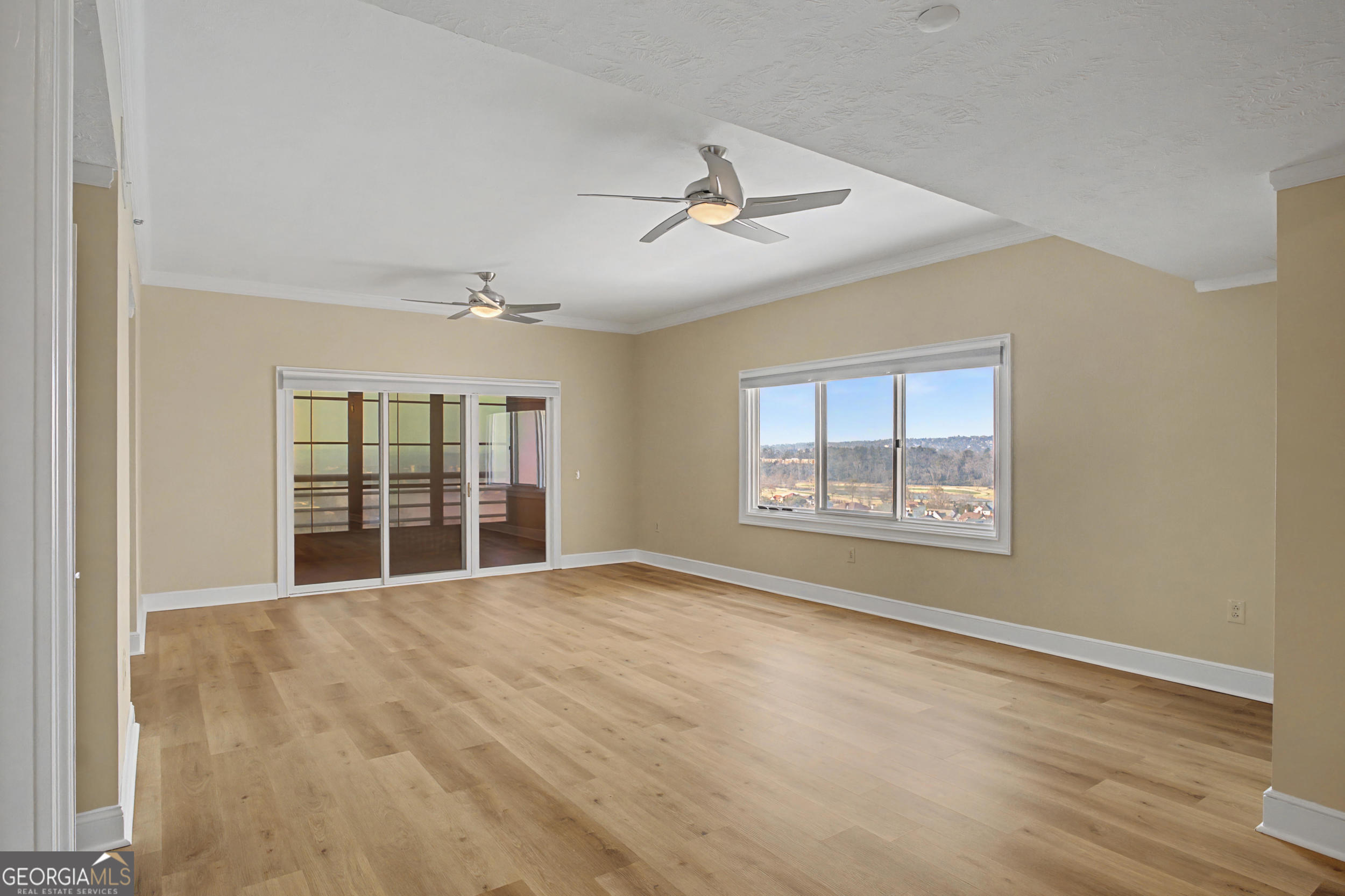 1 7th Street, Unit 1402 Augusta, GA 30901 - Photo 14 of 38 a view of an empty room with a window
