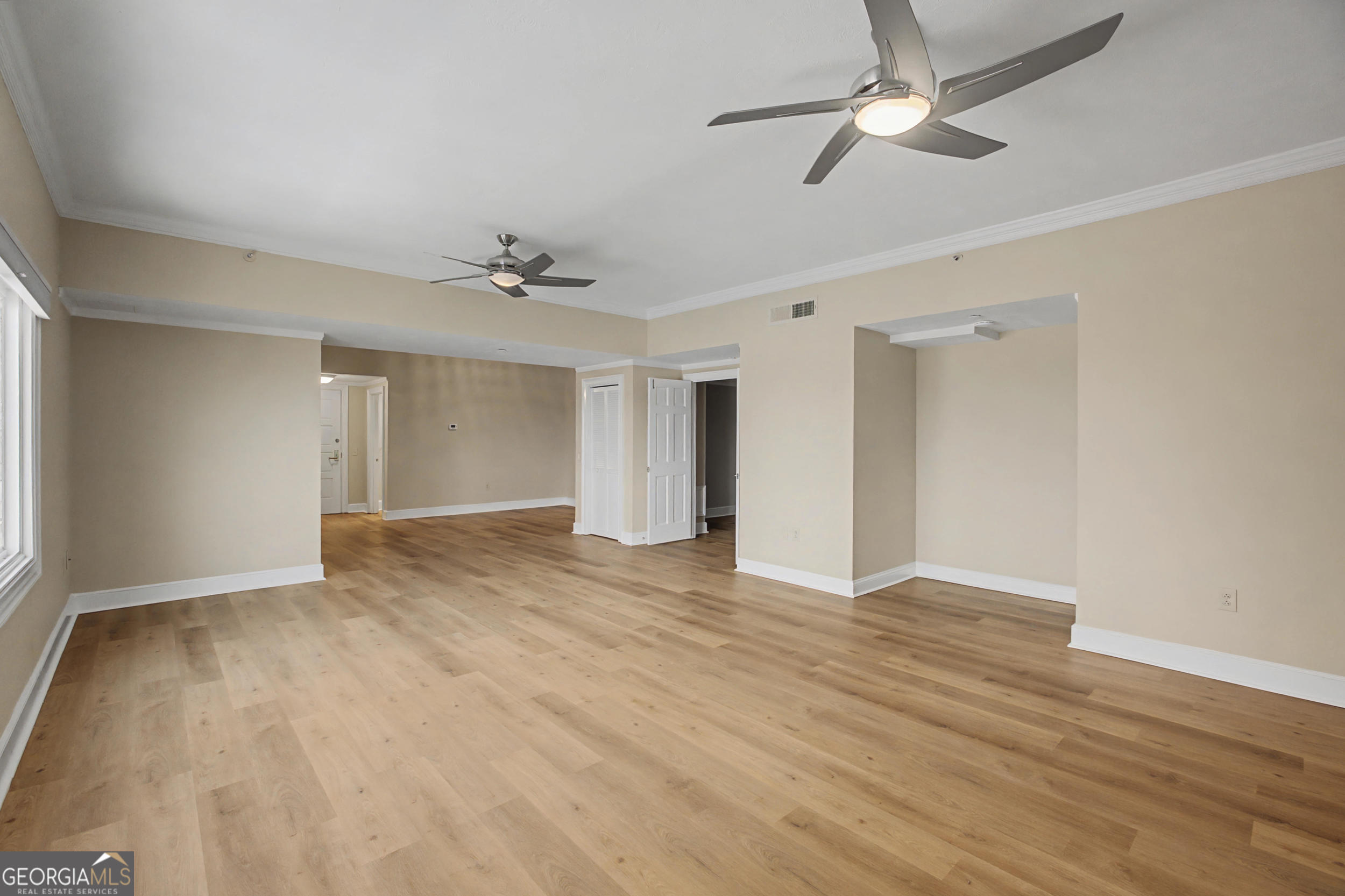 1 7th Street, Unit 1402 Augusta, GA 30901 - Photo 15 of 38 a view of an empty room with a window