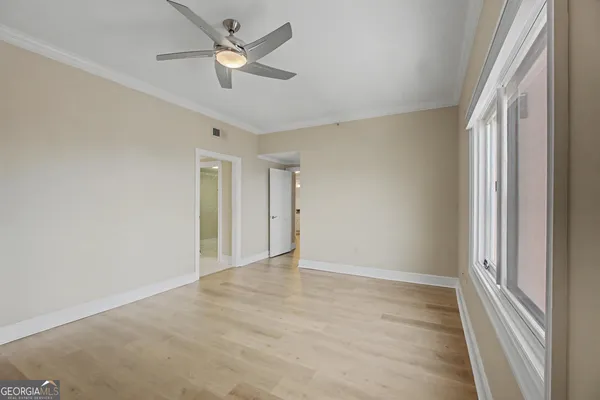 a view of an empty room with a window