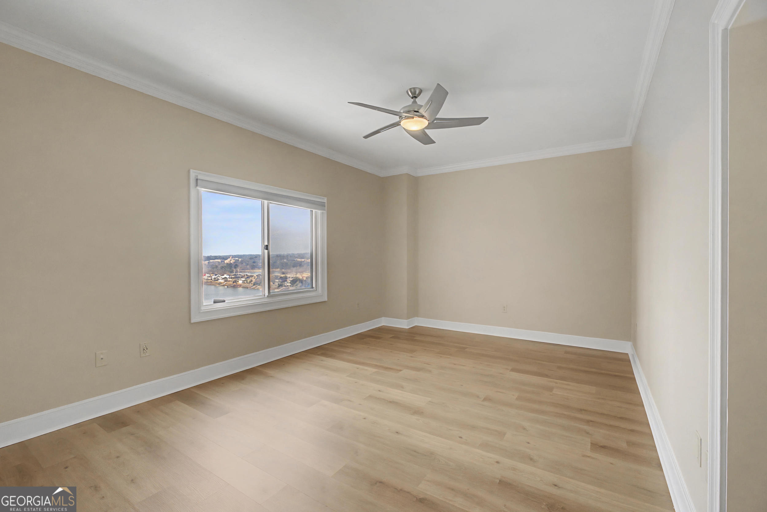 1 7th Street, Unit 1402 Augusta, GA 30901 - Photo 20 of 38 a view of an empty room with a window