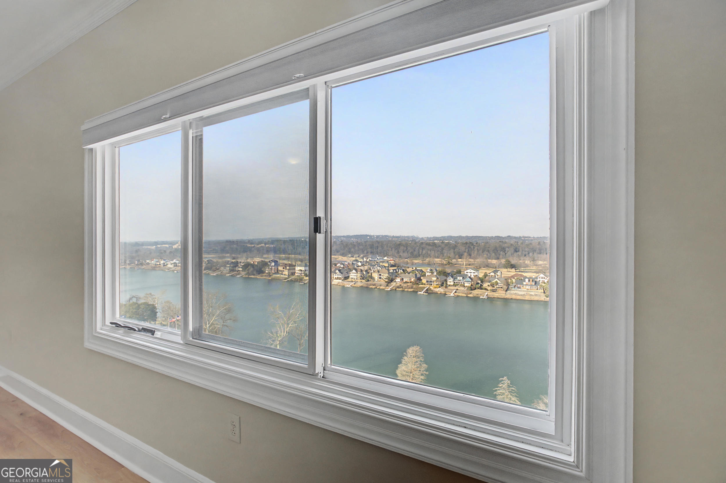 1 7th Street, Unit 1402 Augusta, GA 30901 - Photo 2 of 38 a view of a lake from a window