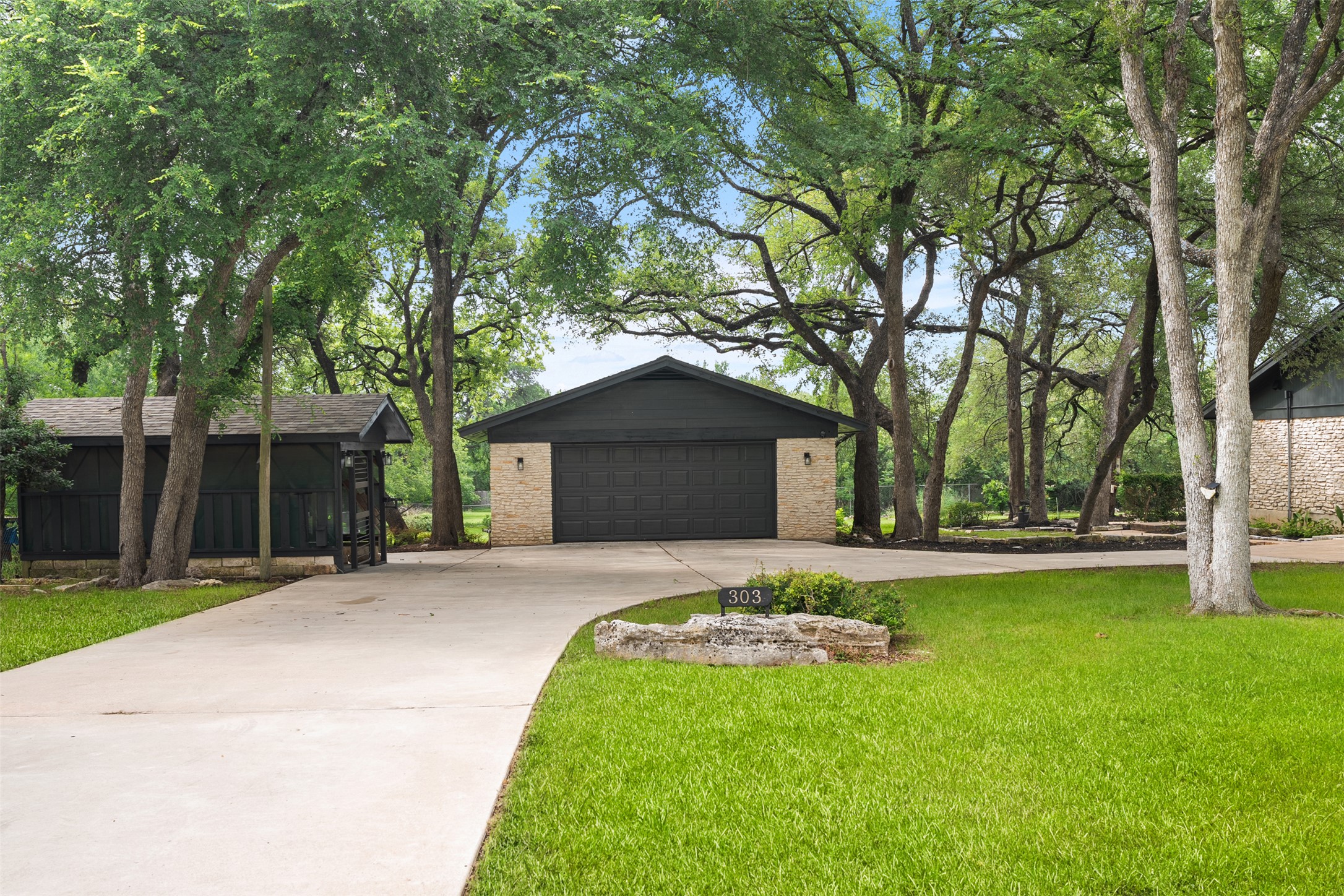 303 West Sequoia Spur Georgetown, TX 78628 - Photo 6 of 34 a front view of house with yard and green space