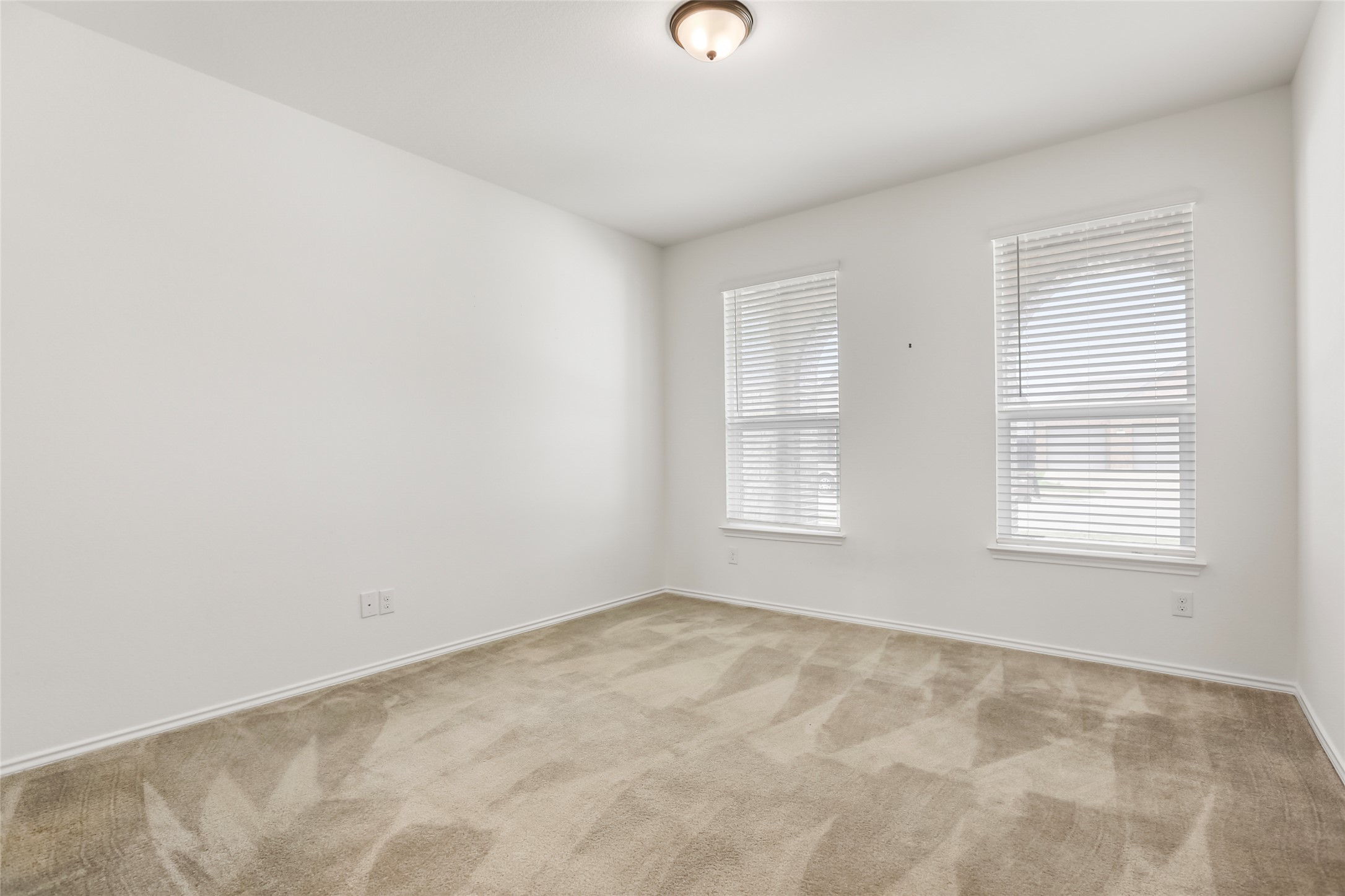 18917 Rushmore Street Manor, TX 78653 - Photo 6 of 28 an empty room with a window