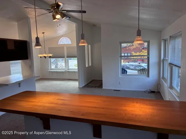 a room with pool table and a flat screen tv