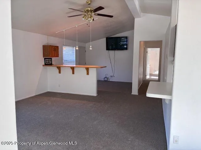 a view of a livingroom with a flat screen tv