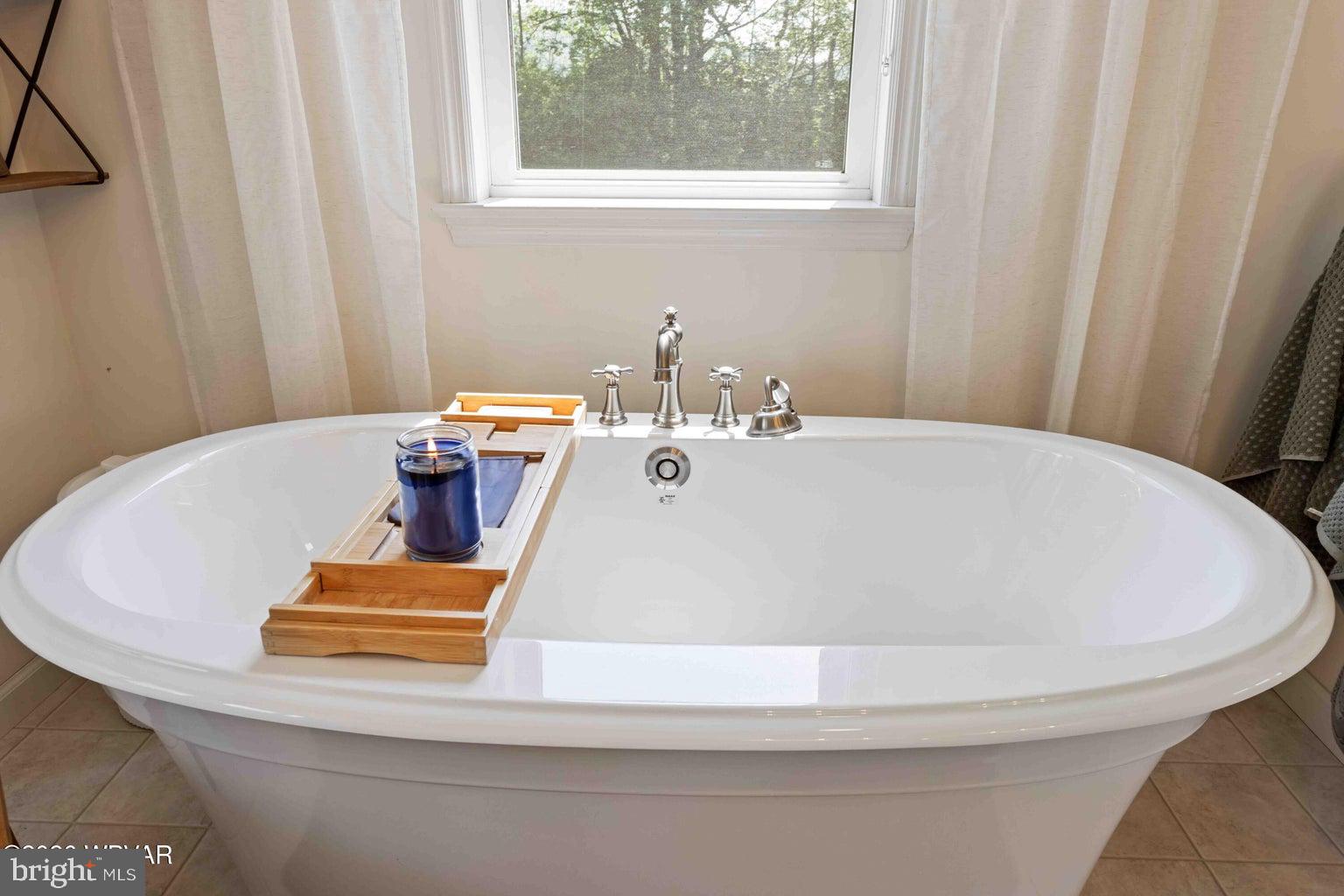 92 Easton Road Trout Run, PA 17771 - Photo 62 of 108 Serene soaking tub with natural light.