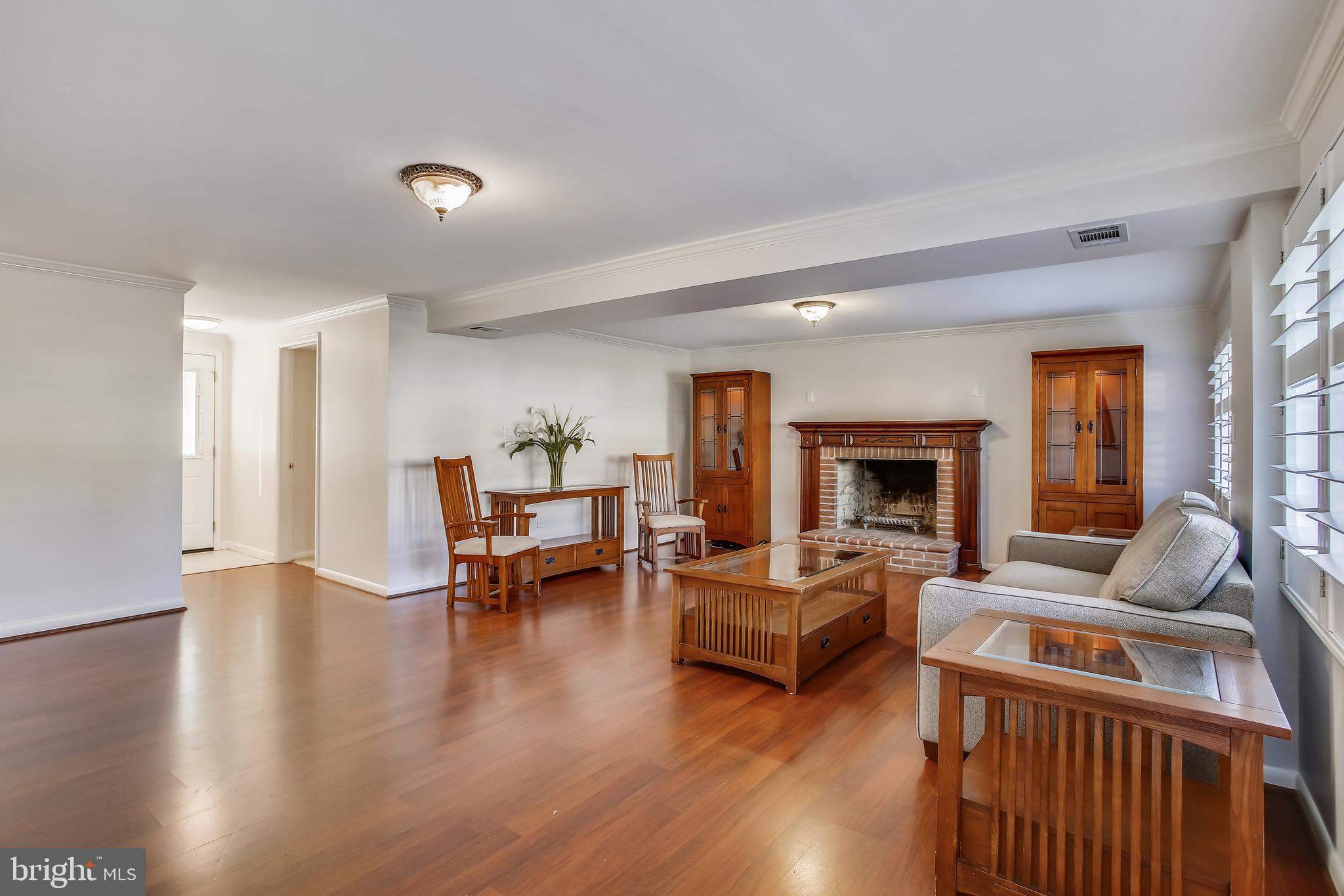 8915 Battery Road Alexandria, VA 22308 - Photo 25 of 57 Very large family room with fireplace