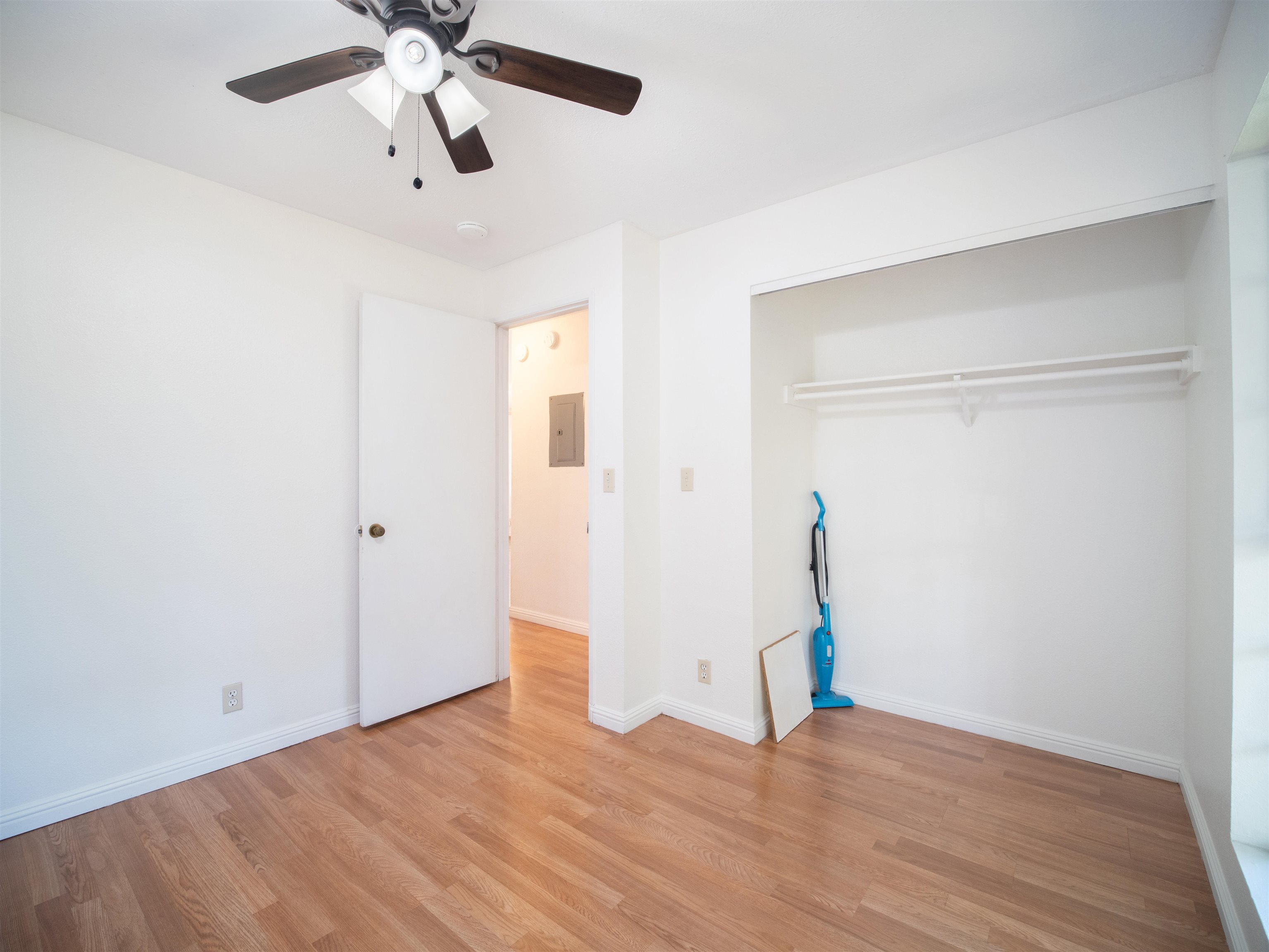 140 Uwapo Road, Unit 43204 Kihei, HI 96753 - Photo 12 of 21 a view of empty room with wooden floor and fan