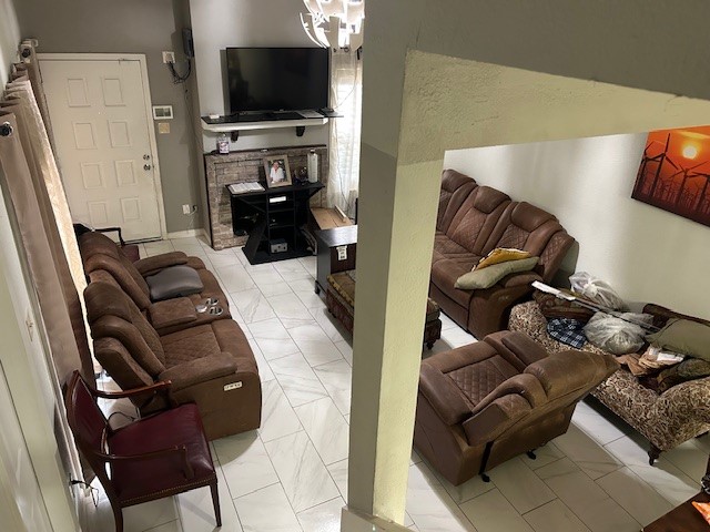 13046 Leader Street, Unit 976 Houston, TX 77072 - Photo 2 of 18 a living room with furniture and a flat screen tv