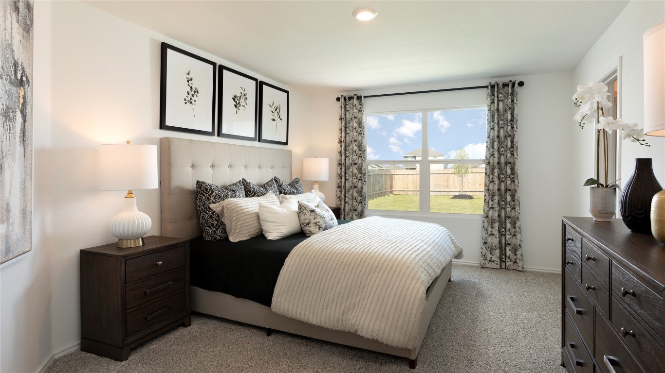 1409 Roaming Oak Bend Georgetown, TX 78628 - Photo 11 of 11 a bedroom with two beds and a window