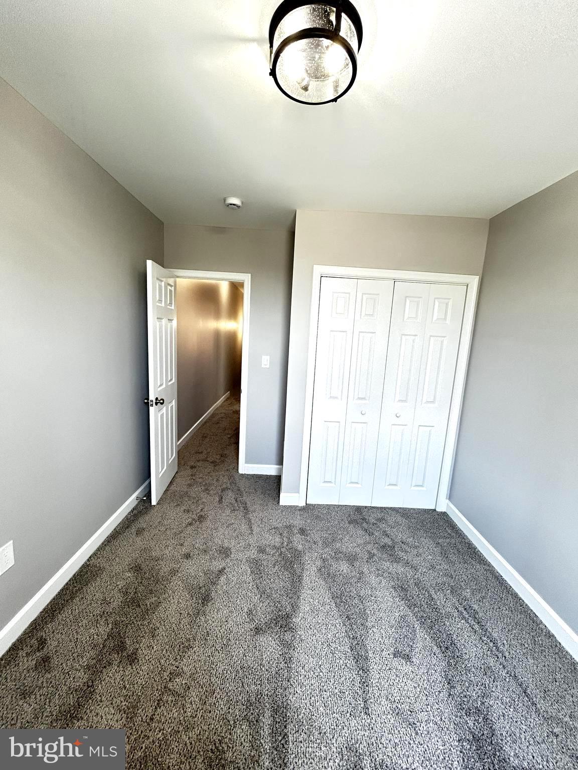 2815 East Chase Street Baltimore, MD 21213 - Photo 20 of 40 an empty room with window
