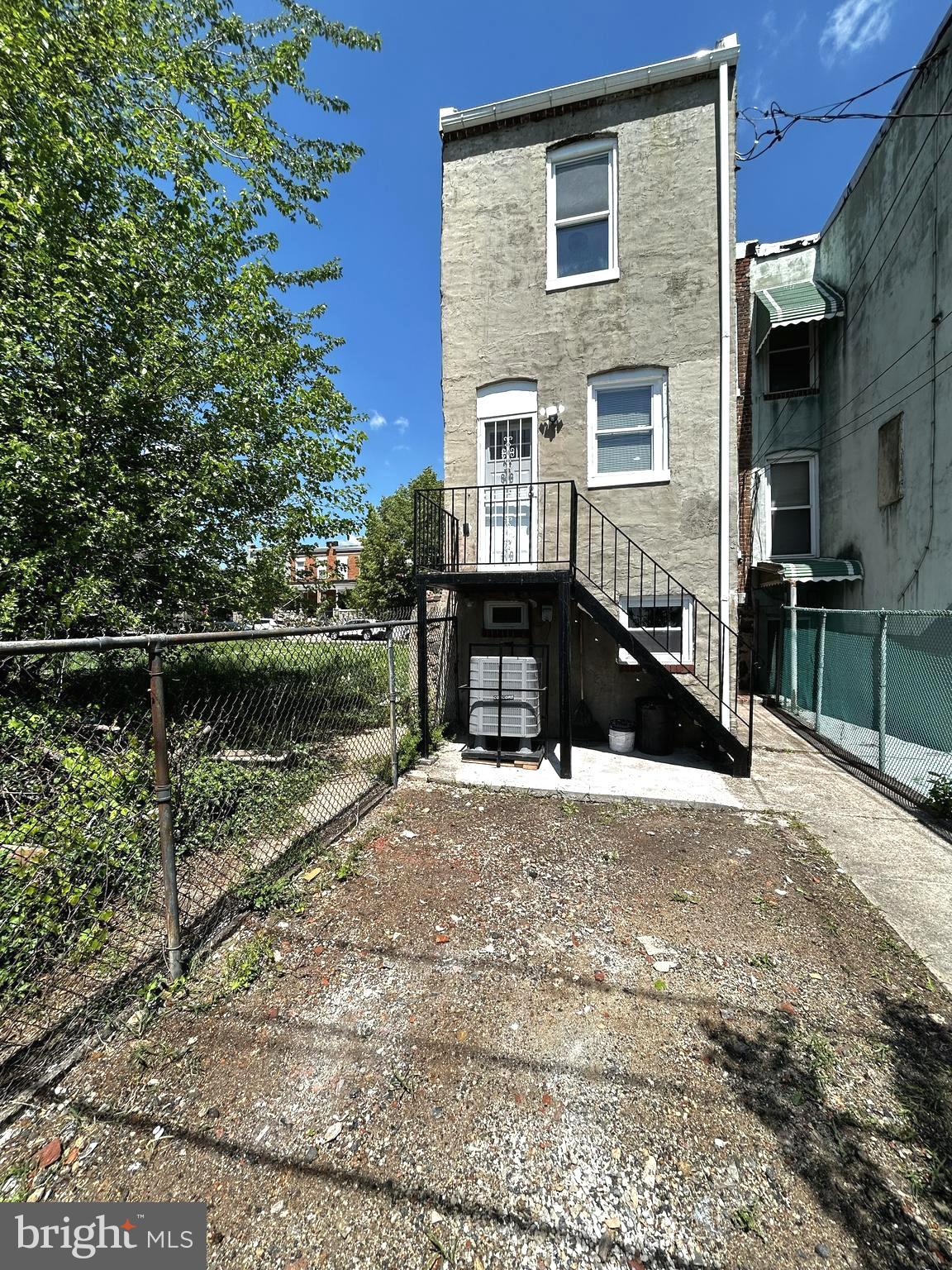 2815 East Chase Street Baltimore, MD 21213 - Photo 37 of 40 a view of a house with a yard