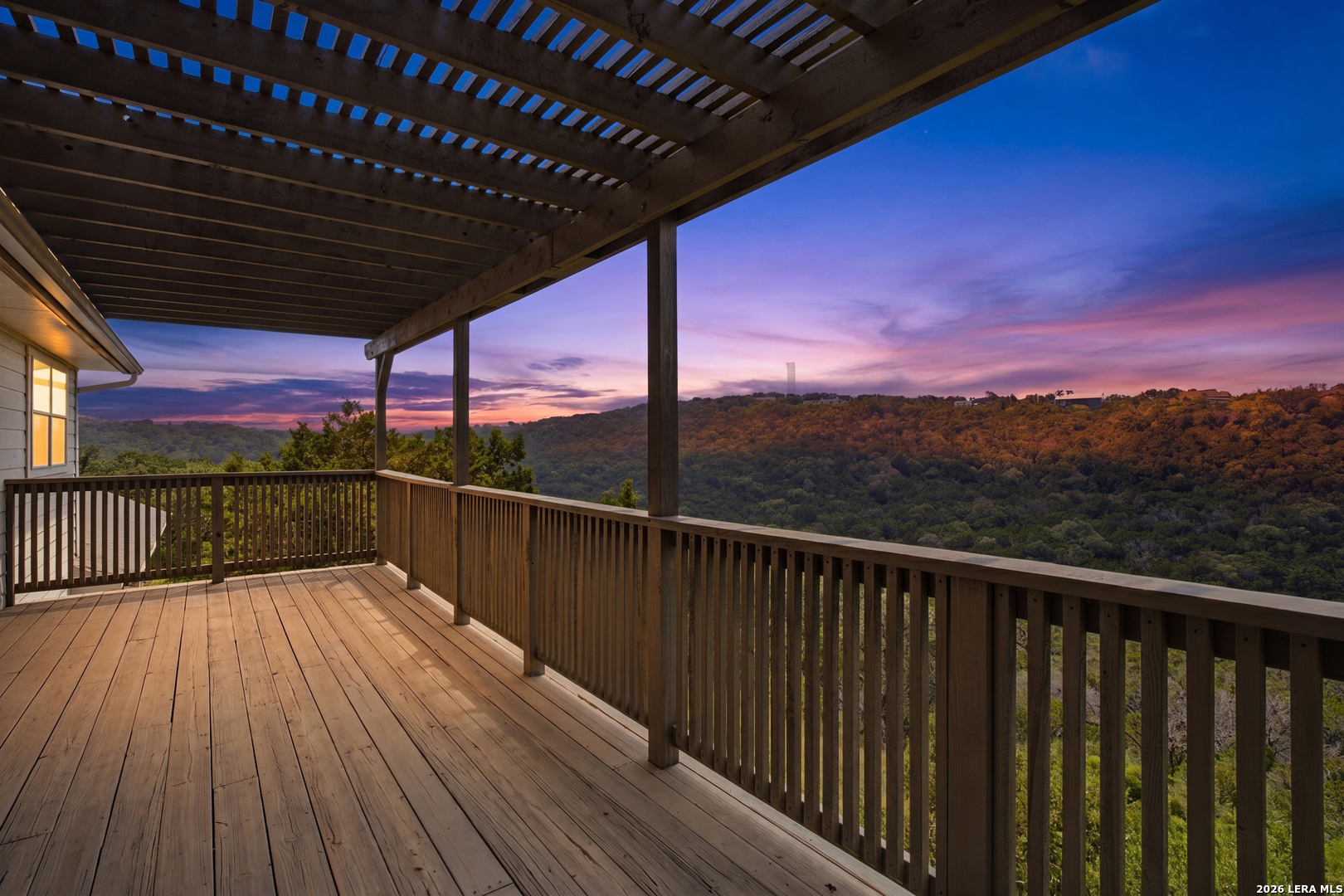 9846 Cash Mountain Road Helotes, TX 78023 - Photo 39 of 50 a view of balcony with a patio