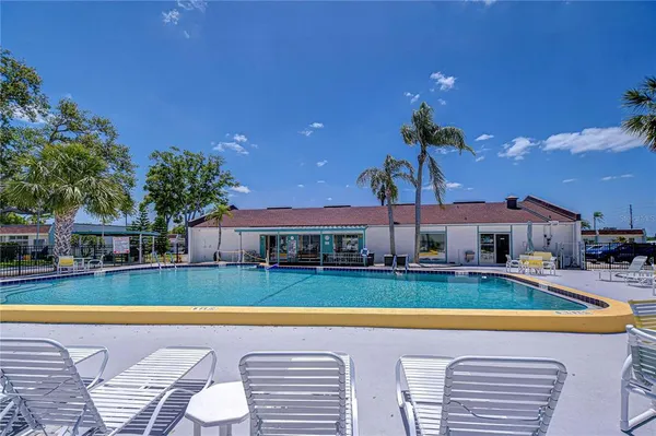 a view of a house with swimming pool