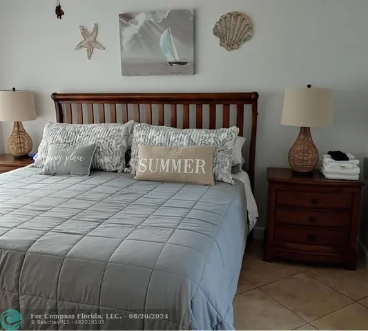 a view of swimming pool with outdoor seating