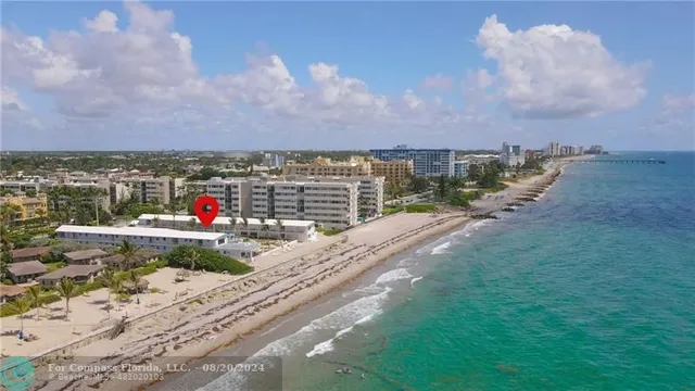 a view of a balcony with chairs