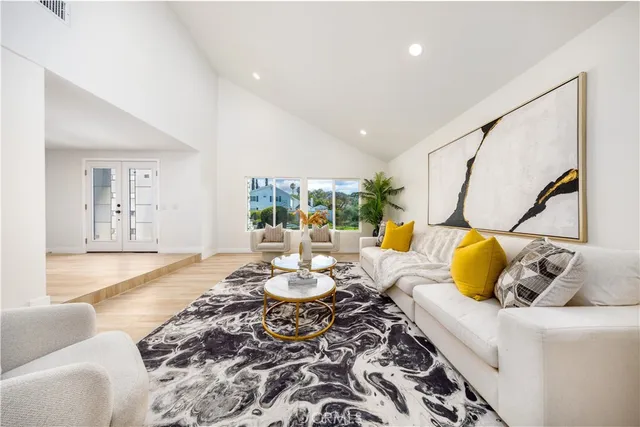 a living room with furniture and a couch