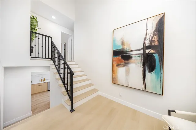 a spacious bathroom with a double vanity sink and a mirror
