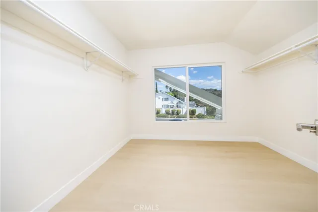 a view of a patio with a table and chairs